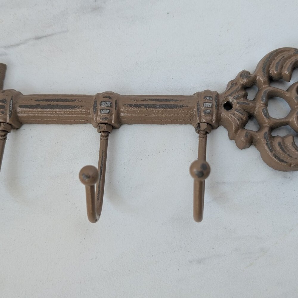 Cast Iron Figure Hook Bar